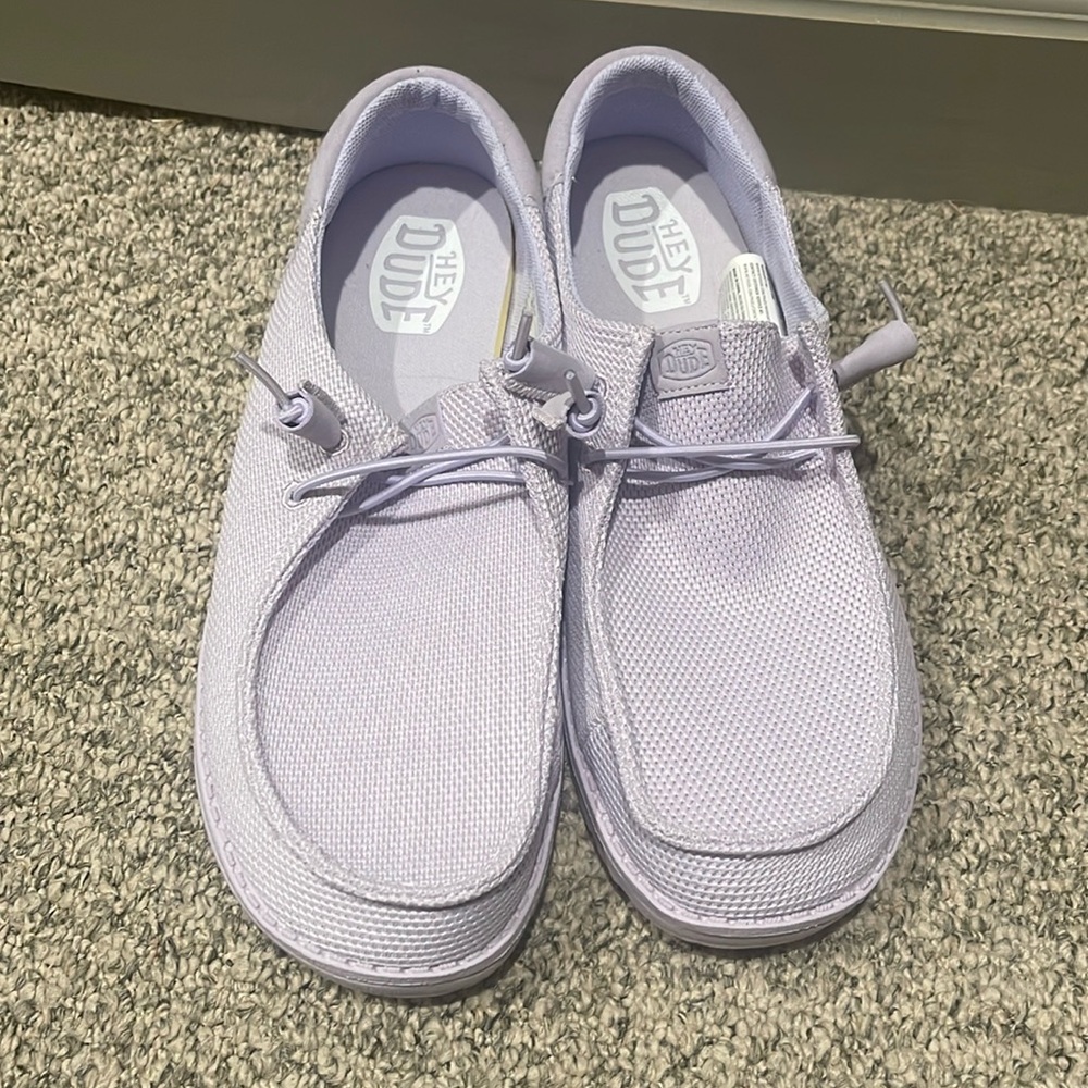 Lavender never worn. Doesn’t have tags but brand new and never worn
